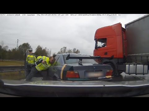 Semi stops BMW fleeing from police